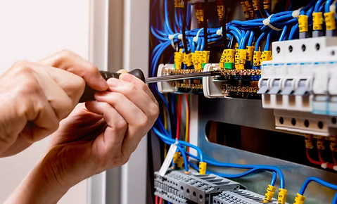https://www.commercialelectriciansinstaffordshire.co.uk/wp-content/uploads/2026/06/Electrician-1.png